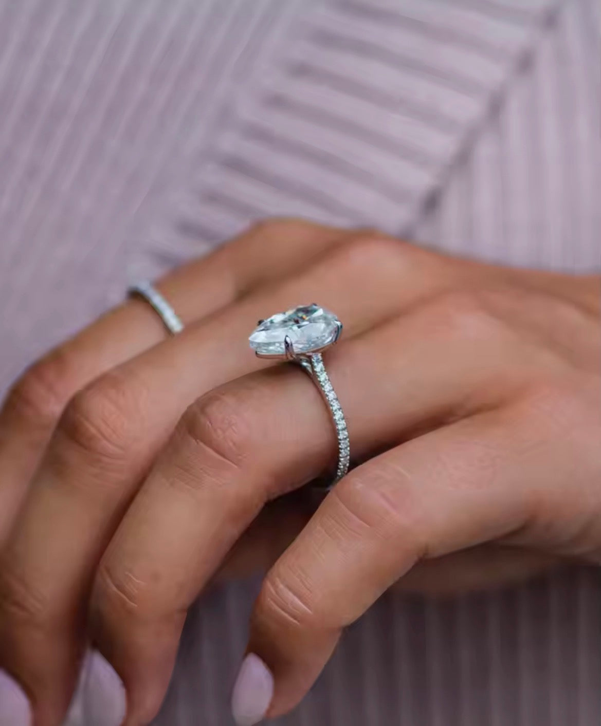 6 carat pear Moissanite Pave band