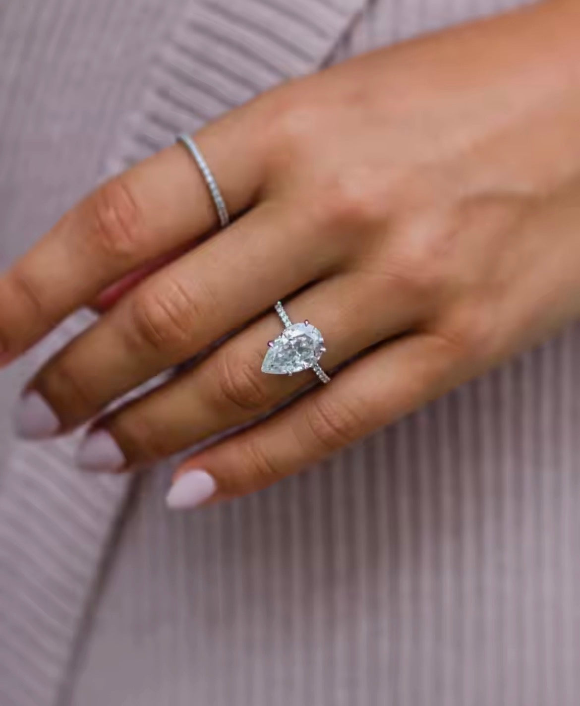 6 carat pear Moissanite Pave band