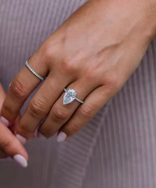 6 carat pear Moissanite Pave band