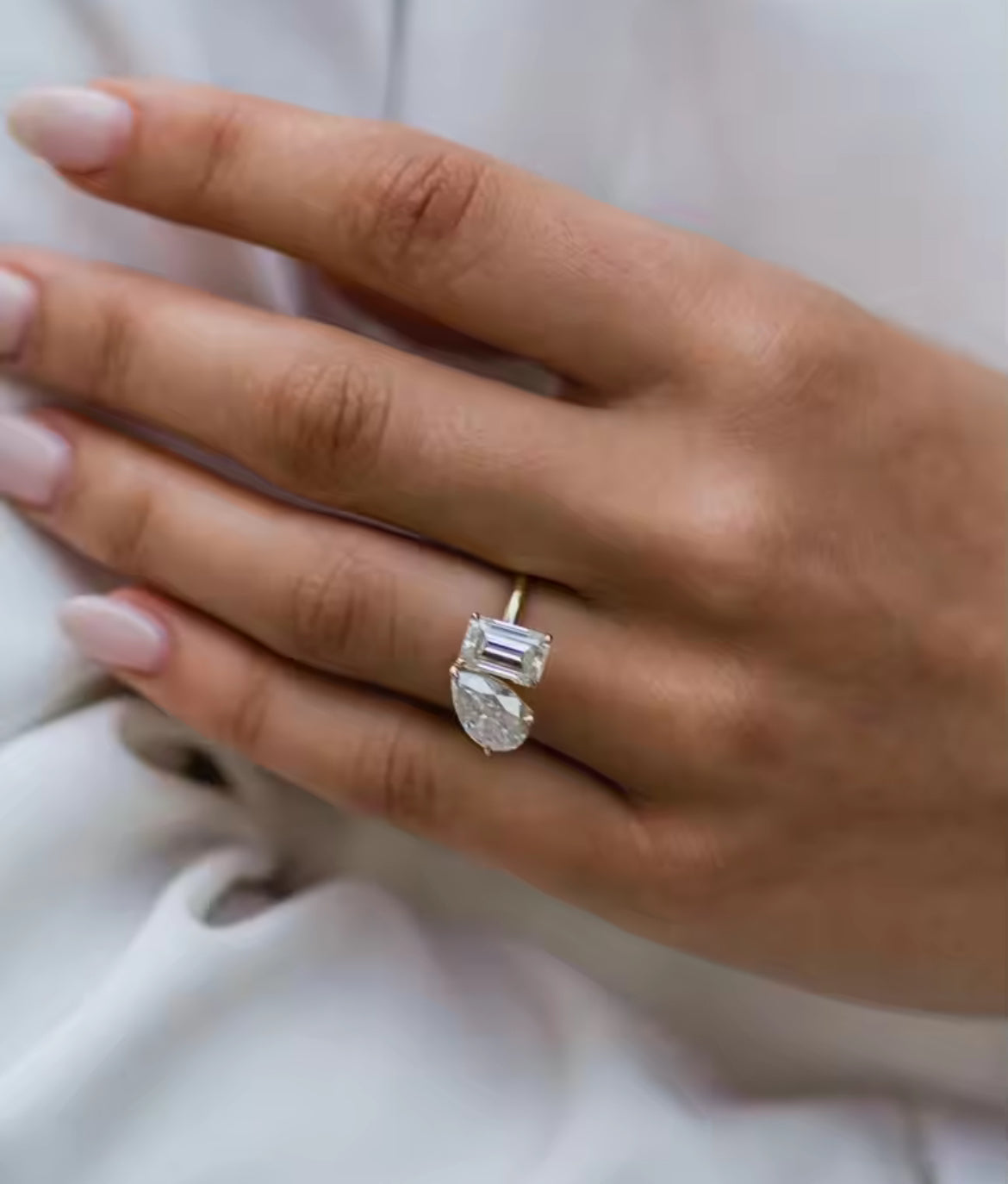 2.5ct pear and 2ct emerald Moissanite Ring