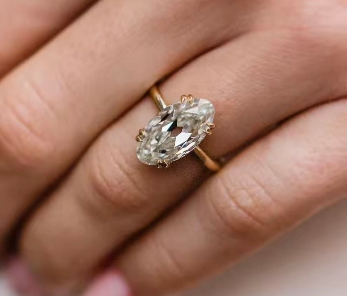 6 carat old mine cut oval Moissanite ring