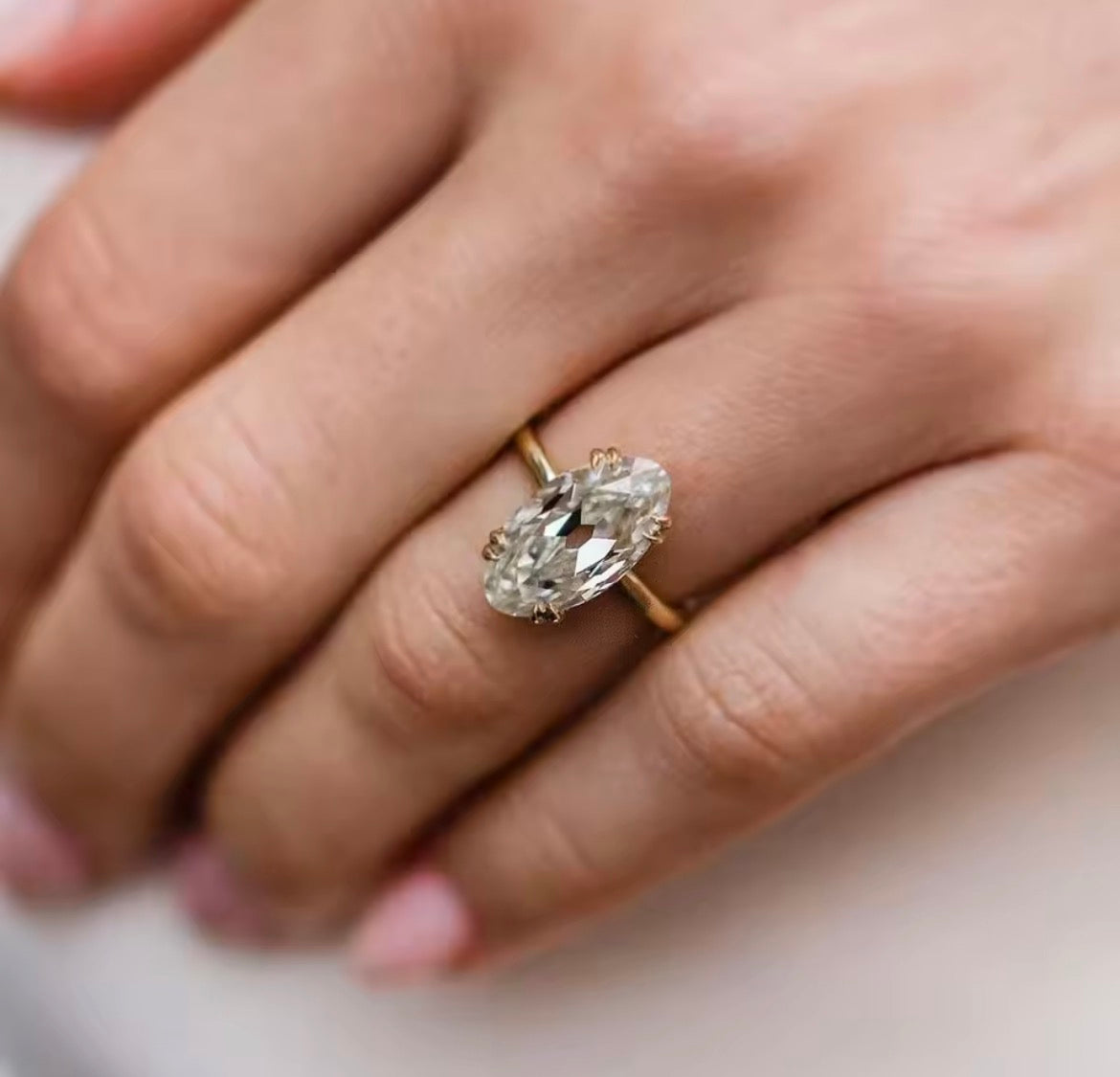 6 carat old mine cut oval Moissanite ring