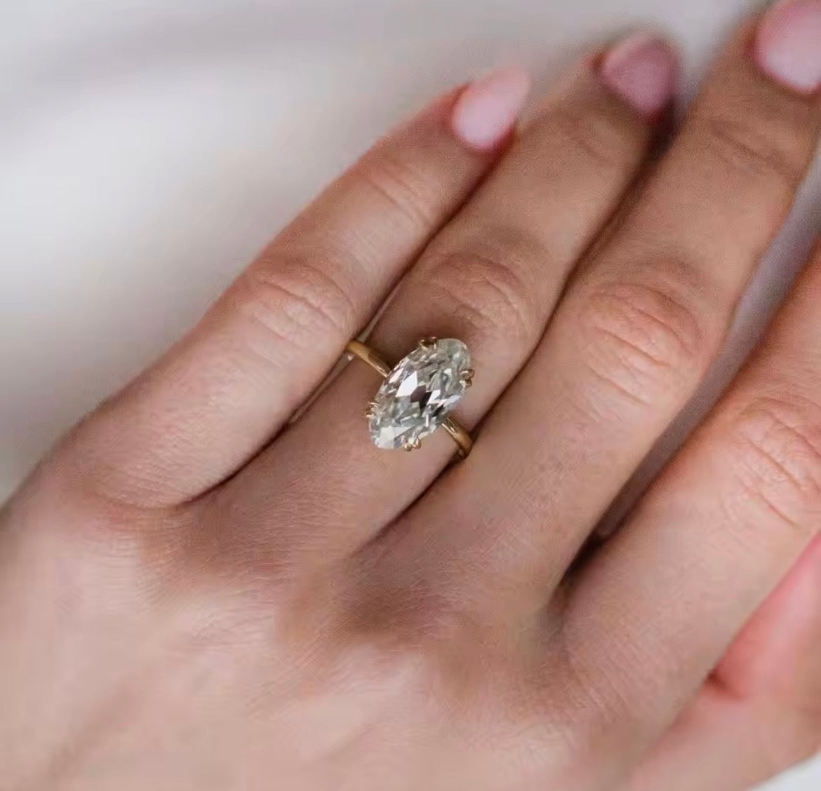 6 carat old mine cut oval Moissanite ring
