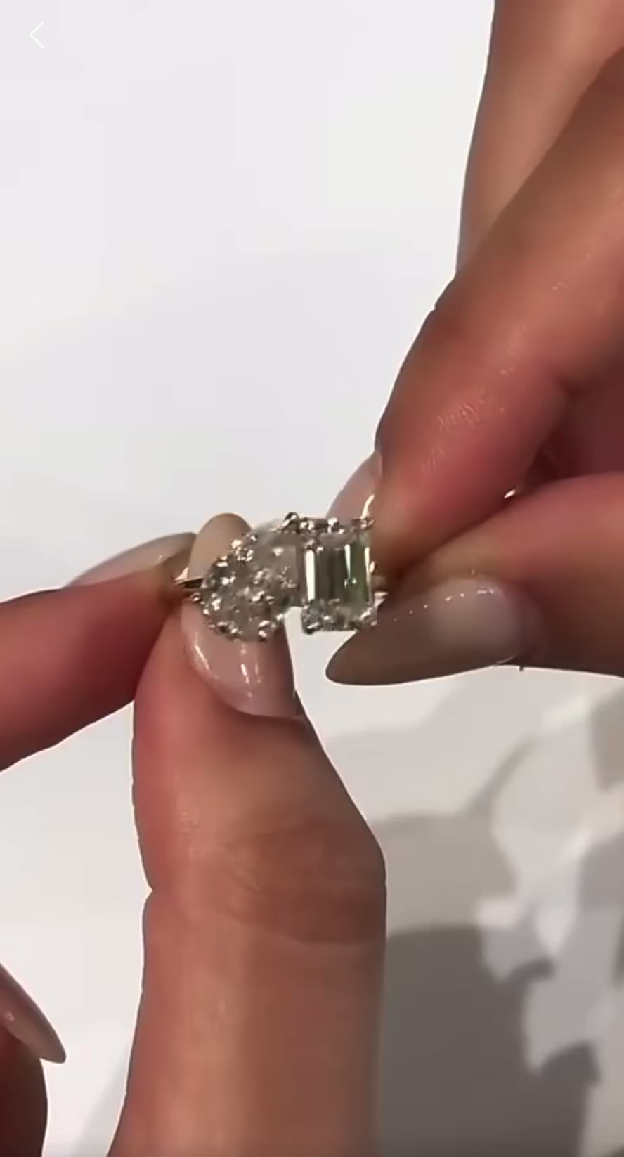 2.5ct pear and 2ct emerald Moissanite Ring