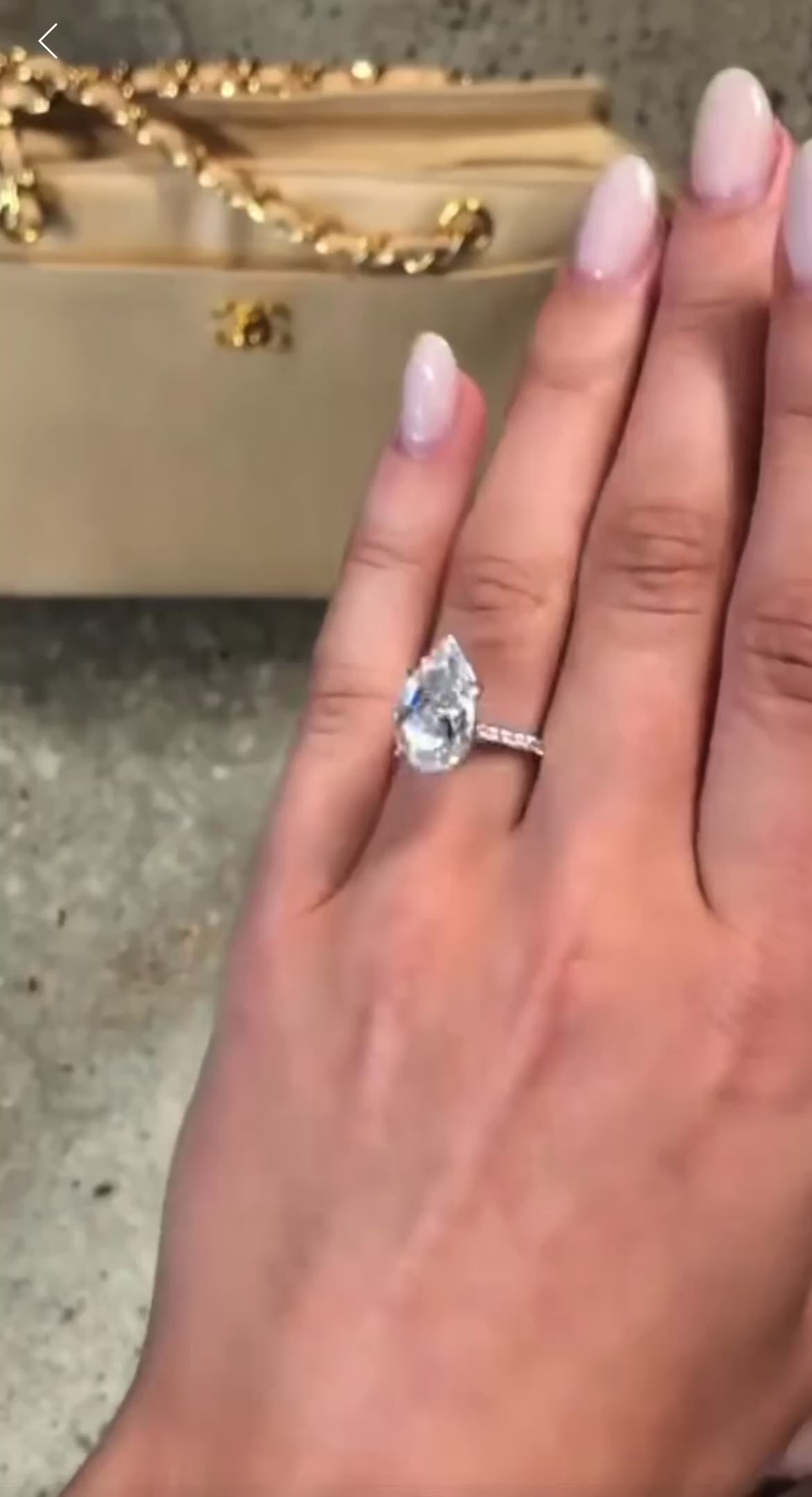 6 carat pear Moissanite Pave band